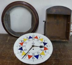 A Victorian mahogany circular fusee wall clock, the painted dial bearing R.A.F. inscription