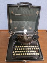 A small set of stepladders, a vintage typewriter and a bergen