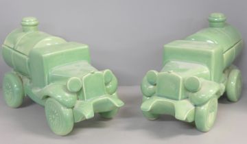 A pair of mid 20th Century green ceramic water trucks/tankers, 33cm