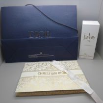 A collection of Dior and Chanel boxes, packaging, ribbons, boxes, etc.