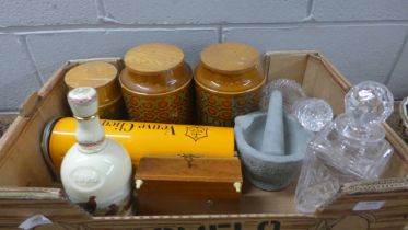 Three Hornsea storage jars, a wooden jewellery box, two glass decanters, a storage tin and a
