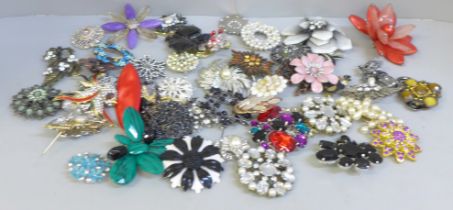 Fifty large costume brooches