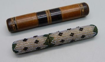 Two 19th Century needle cases, one wooden, one beadwork