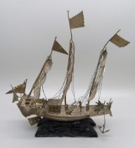 A Chinese silver junk, 16cm tall