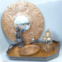 An Arts and Crafts copper mirror, a Newlyn copper pot, another Arts and Crafts tray, a bust,