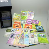 Over 500 assorted Pokemon cards in ETB box, some shiny cards