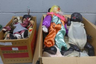 Two boxes of mixed dolls, vintage and modern, including a clown, black doll, native American squaws,
