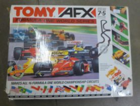 A Tomy Formula 1 World Series racing car set