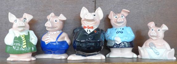 A set of five Wade Nat West pig money banks