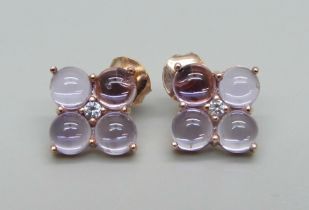 A pair of silver gilt, pink cabochon stone and zircon earrings