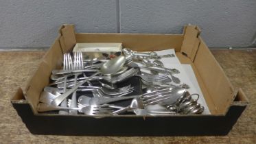 A collection of plated flatware, cased knives, collectors spoons and St. Christopher pendants **