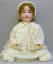 A large antique German Armand Marseille bisque head doll 992A11M, height 22"/56cm