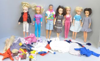 Six vintage Pedigree Sindy dolls, one Paul, Sindy clothes and shoes