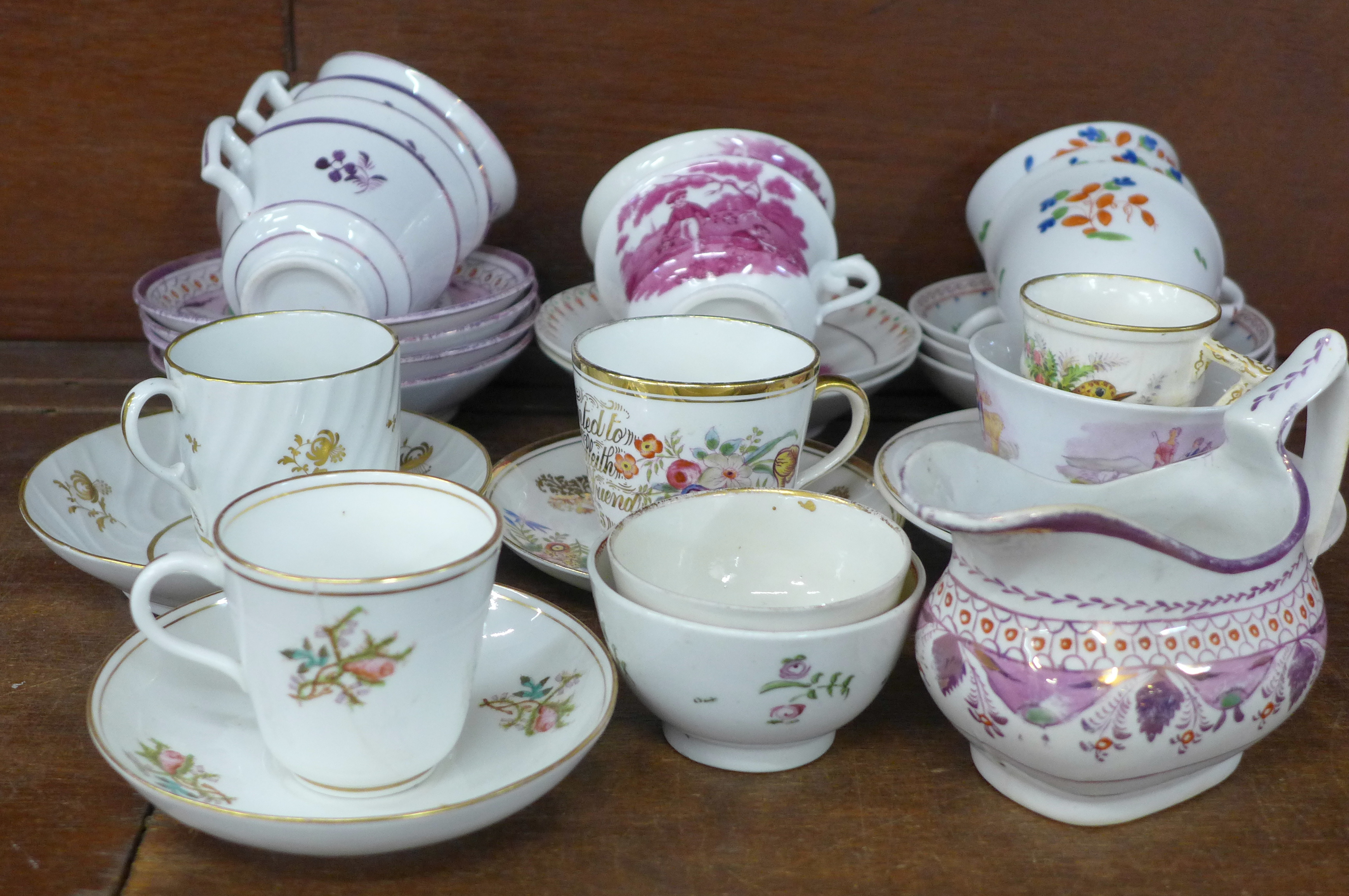 Four Victorian pink lustre cups and saucers, a similar cream jug, two other Victorian cups and