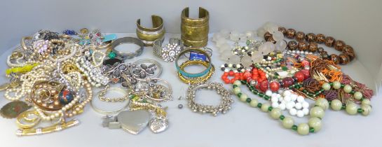 Three bags of costume jewellery, necklaces and bangles