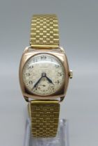 A 9ct gold cased wristwatch, dial signed Dominant, 27mm case