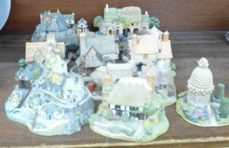 A collection of thirteen Lilliput Lane houses including two RNLI stations