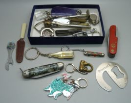 Penknives, a whistle, bottle openers, etc.