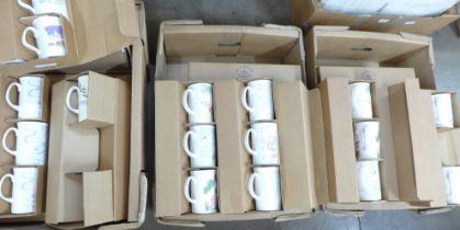 A collection of Royal Malvern mugs; 24 x 6 mug sets (17 large and 7 small), 1 x 5 mug set and 1 x