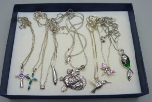 Eight silver pendants and chains including one by Fossil, 40g