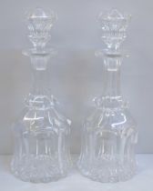 A pair of Georgian mallet shaped glass decanters
