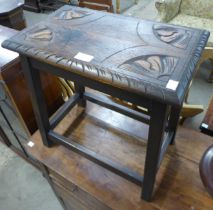 A carved oak stool