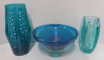 A heavy blue glass dish and two other pieces of blue studio glass