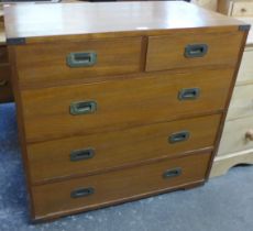 A teak campaign style chest of drawers