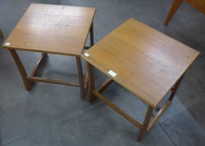 A pair of teak occasional tables