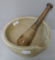 A vintage pestle and mortar