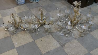 A set of three gilt metal chandeliers