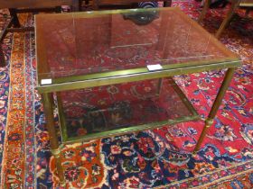 An Italian brass and glass topped coffee table