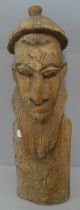 A carved wooden figure, possibly Moorish