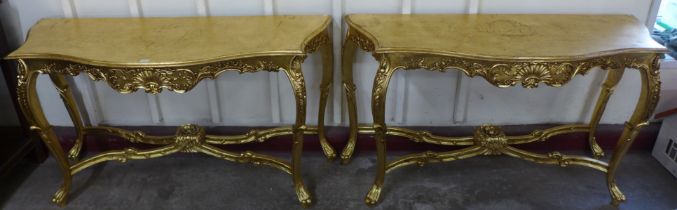 A pair of Louis XV style giltwood console tables