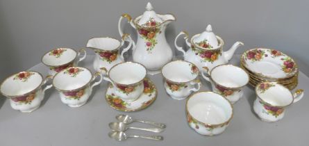 A Royal Albert Old Country Roses six setting tea service and a coffee pot
