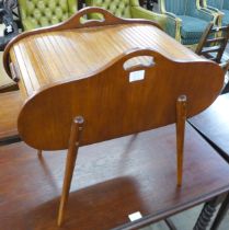 A teak tambour sewing box
