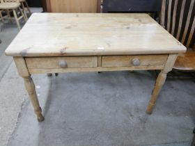 A Victorian style pine two drawer kitchen table