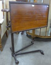 A George V mahogany and cast steel adjustable reading table