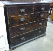 A George III stained pine chest of drawers