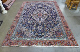 An eastern blue ground rug, 314 x 225cms