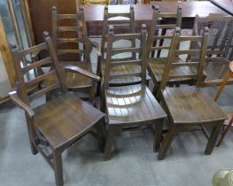 A set of six Arts and Crafts oak ladderback dining chairs