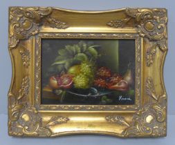 Small still life of fruit, oil on panel, indistinctly signed, framed