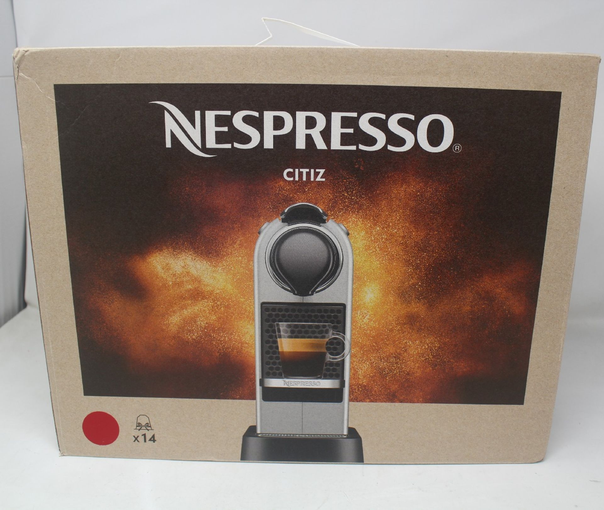 A boxed as new Nespresso Citiz Coffee Machine - Cherry Red.