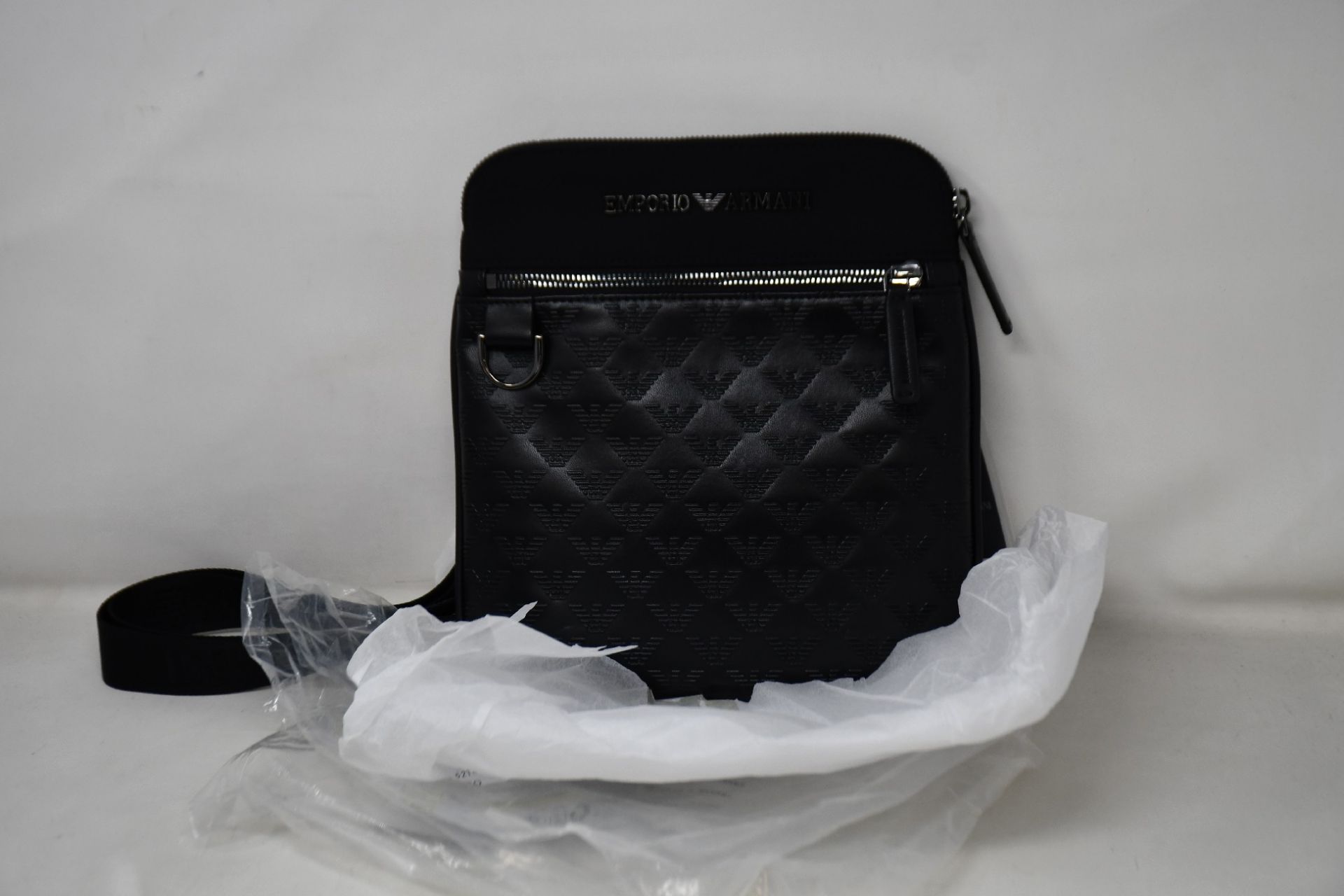 An as new Emporio Armani Flat Crossbody Eagle Pocket Messenger Bag in Black/Black.