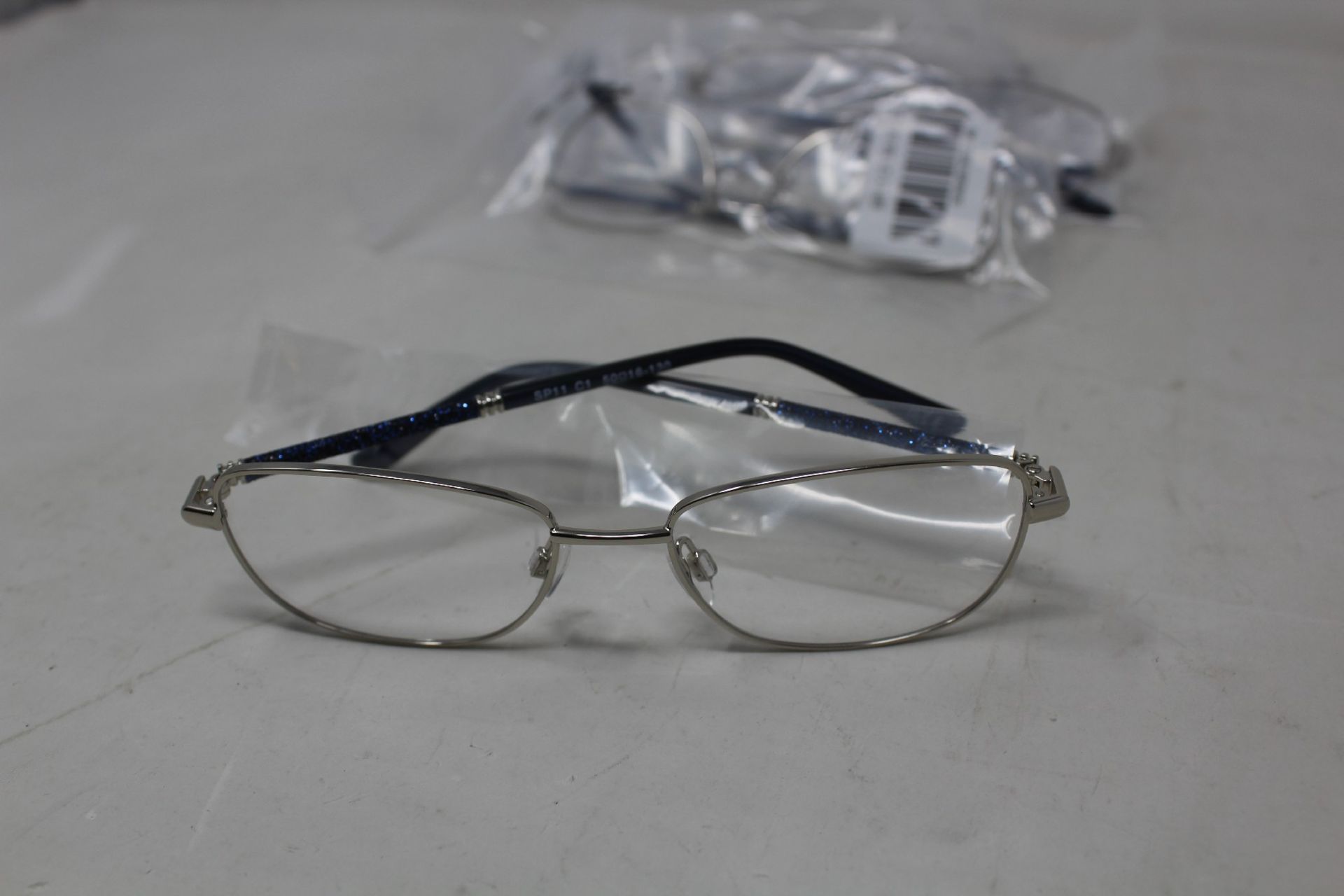 Five pairs of women's Palazzo SP11 C1 50 - 16 -130 silver metal glasses frames with blue sparkle