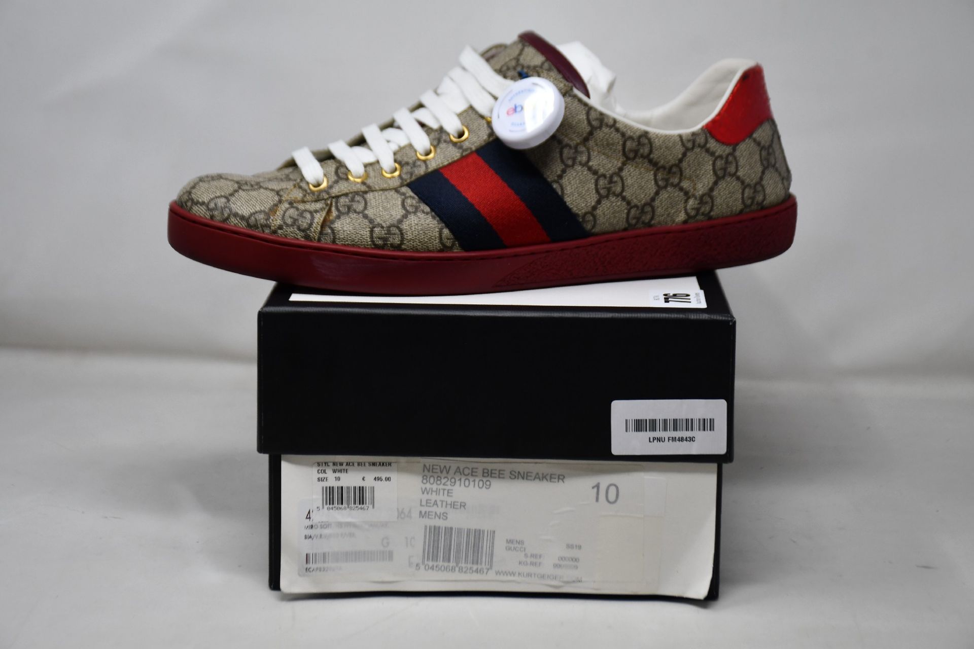 A pair of men's pre-owned Gucci Ace GG Supreme sneakers with authentication tag (UK 10).