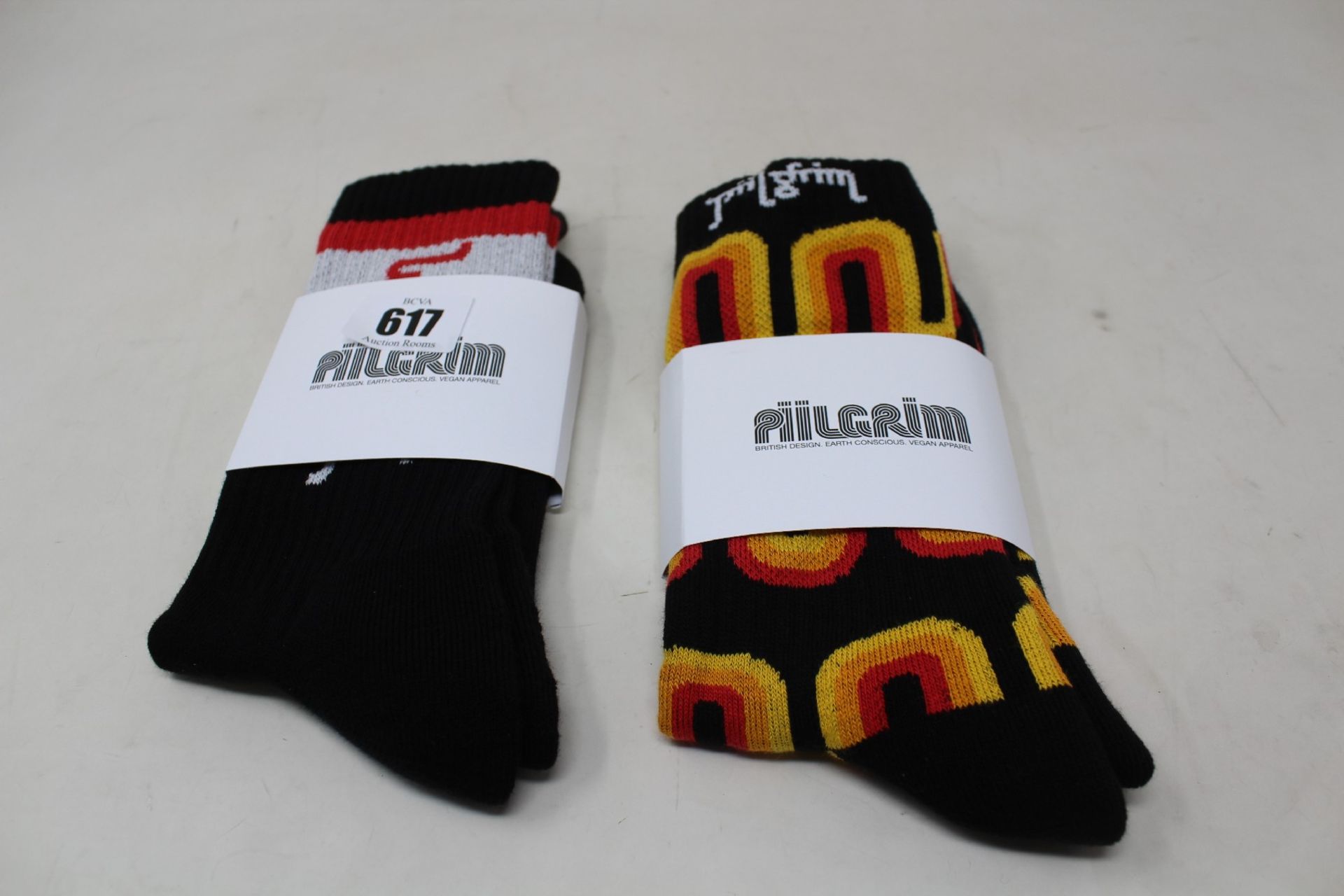 A large quantity of as new Pilgrim Socks in various styles UK 7-11 (Approximately 100 pairs).