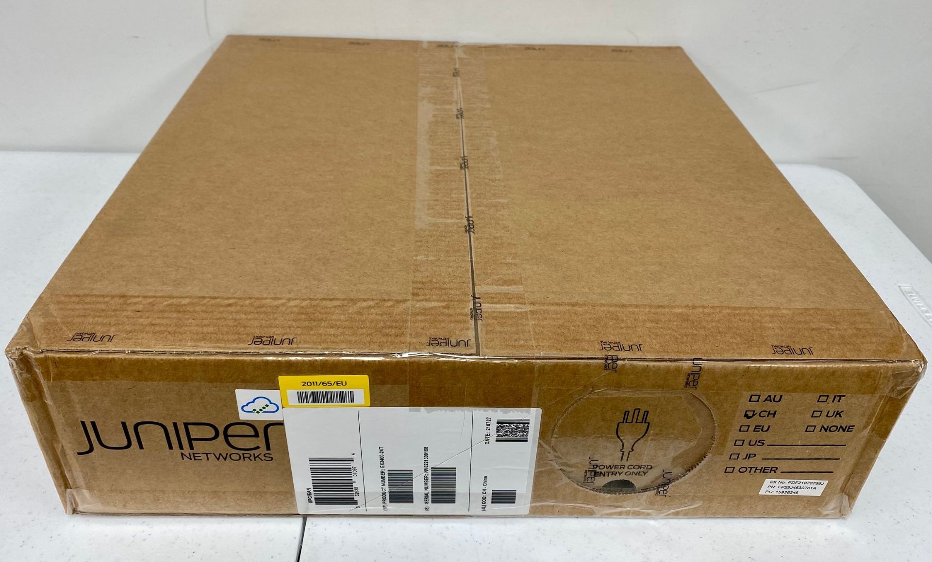 A Juniper EX3400-24T Ethernet Switch (EAN: 832938070974 S/N: NV0221300113) (Appears new, box sealed.