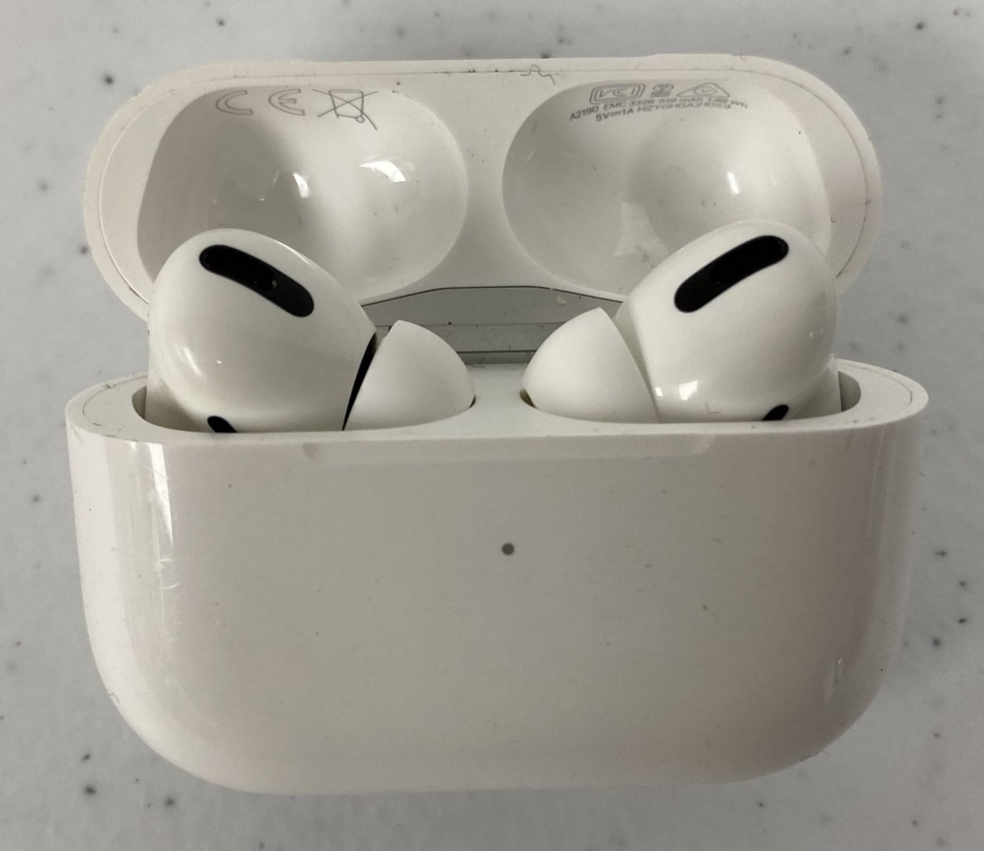 A pre-owned pair of Apple Airpods Pro (A2083+A2084) with Wireless Charging Case (A2190) (Some cosmet