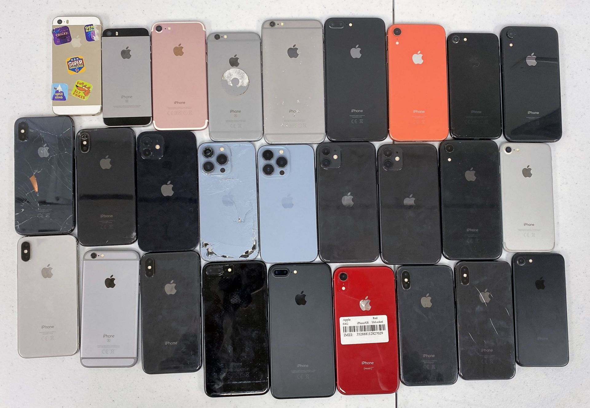 SOLD FOR PARTS: Twenty five assorted pre-owned Apple iPhones sold for parts (All handsets iCloud acc